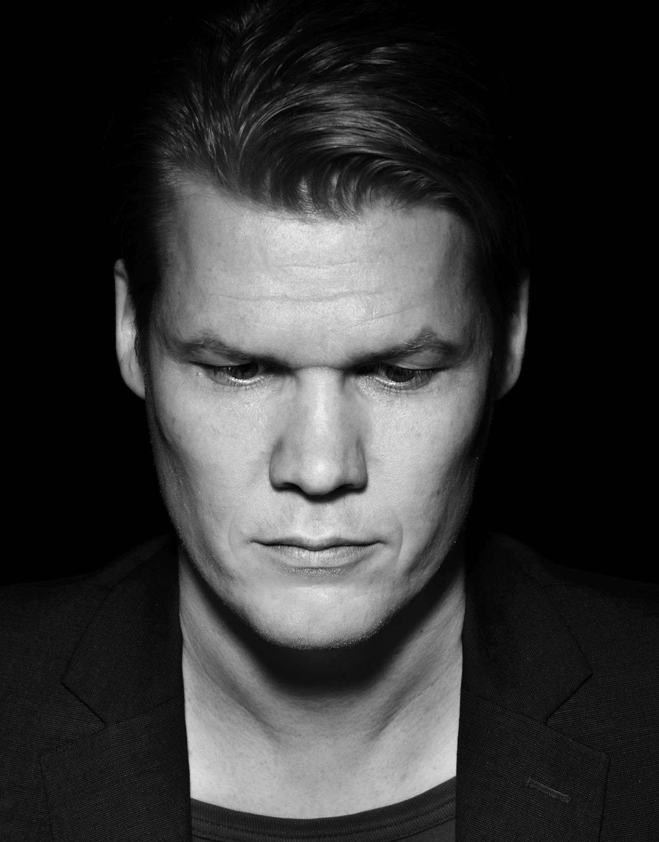 Black-and-white portrait of DJ Tom Silver